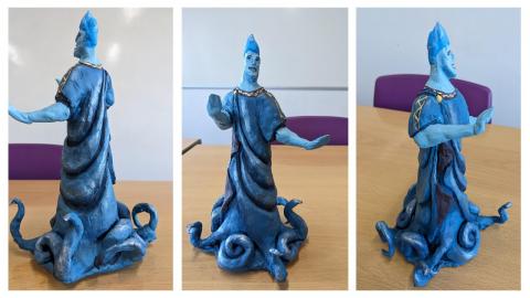 A clay model of Hades, Lord of the Underworld, in the style of Disney's Hercules villain of the same name.
